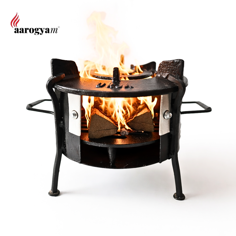Black metal fire pit with flames on a white background, featuring the brand 'aarogya'.