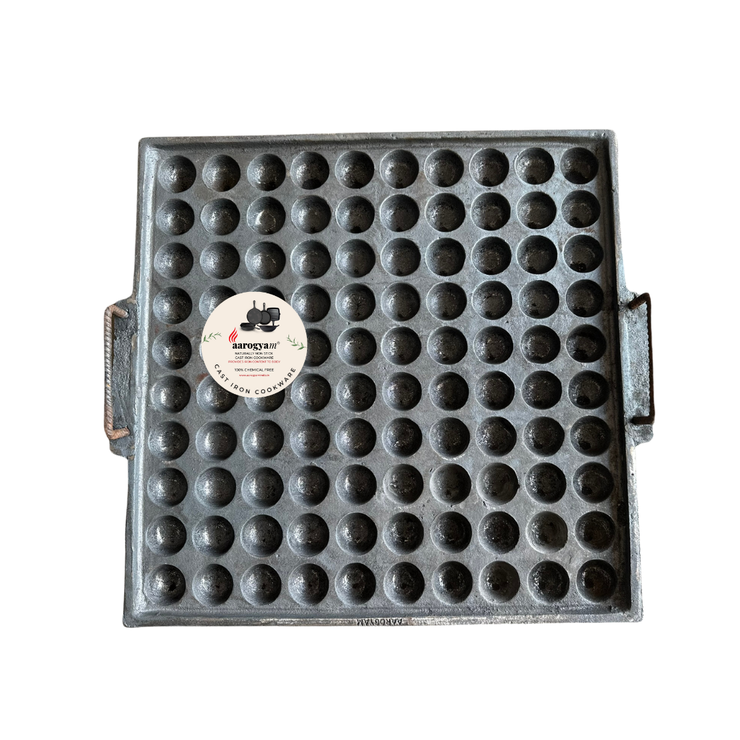 Cast iron waffle cone mold with a brand label on a white background
