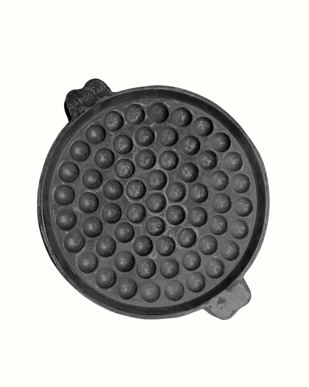 Black round waffle maker with bubble pattern on a white background