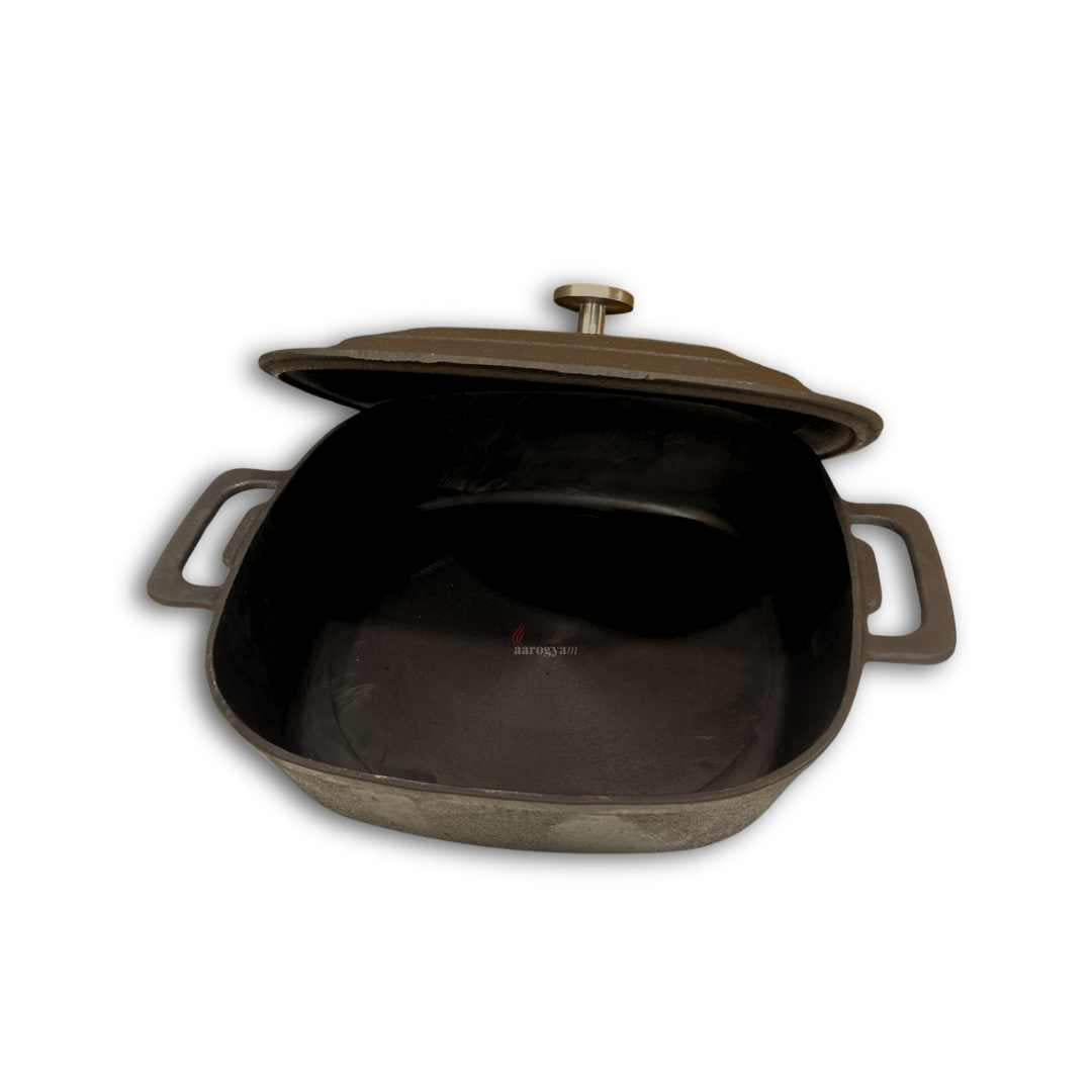 Cast iron skillet with lid on a white background