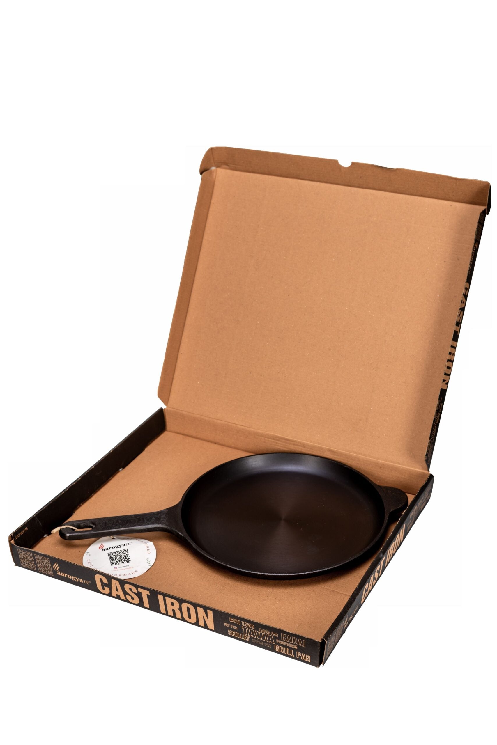 Cast iron skillet in a cardboard box with 'Cast Iron' label on a white background