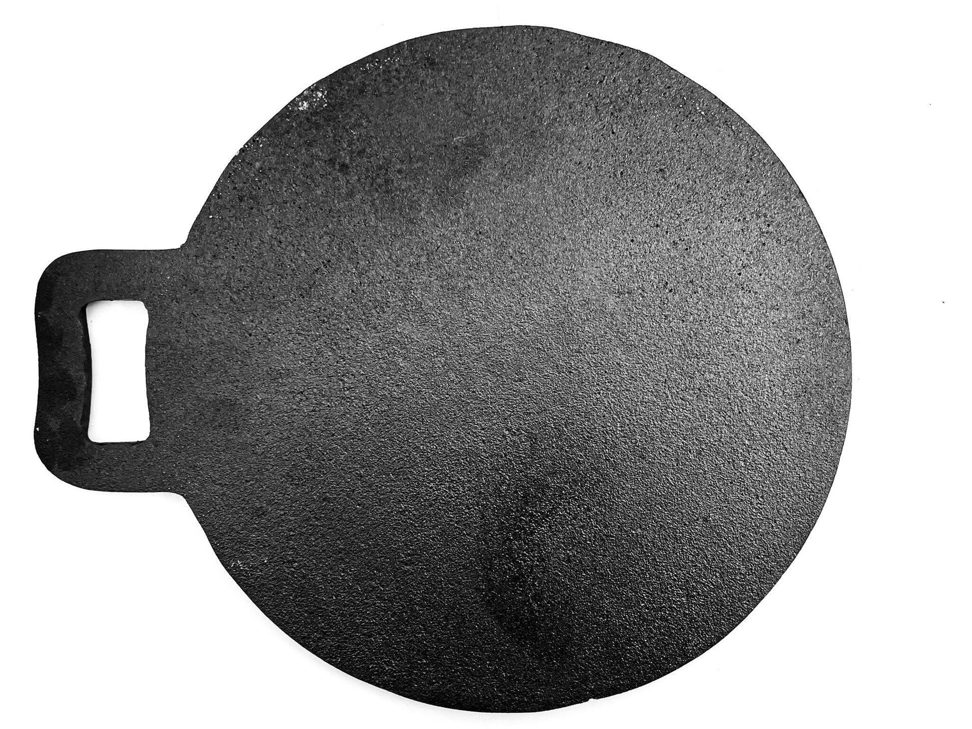 Round black stone with a handle on a white background