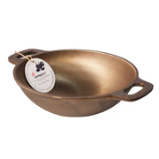 Bronze wok with a tag on a white background
