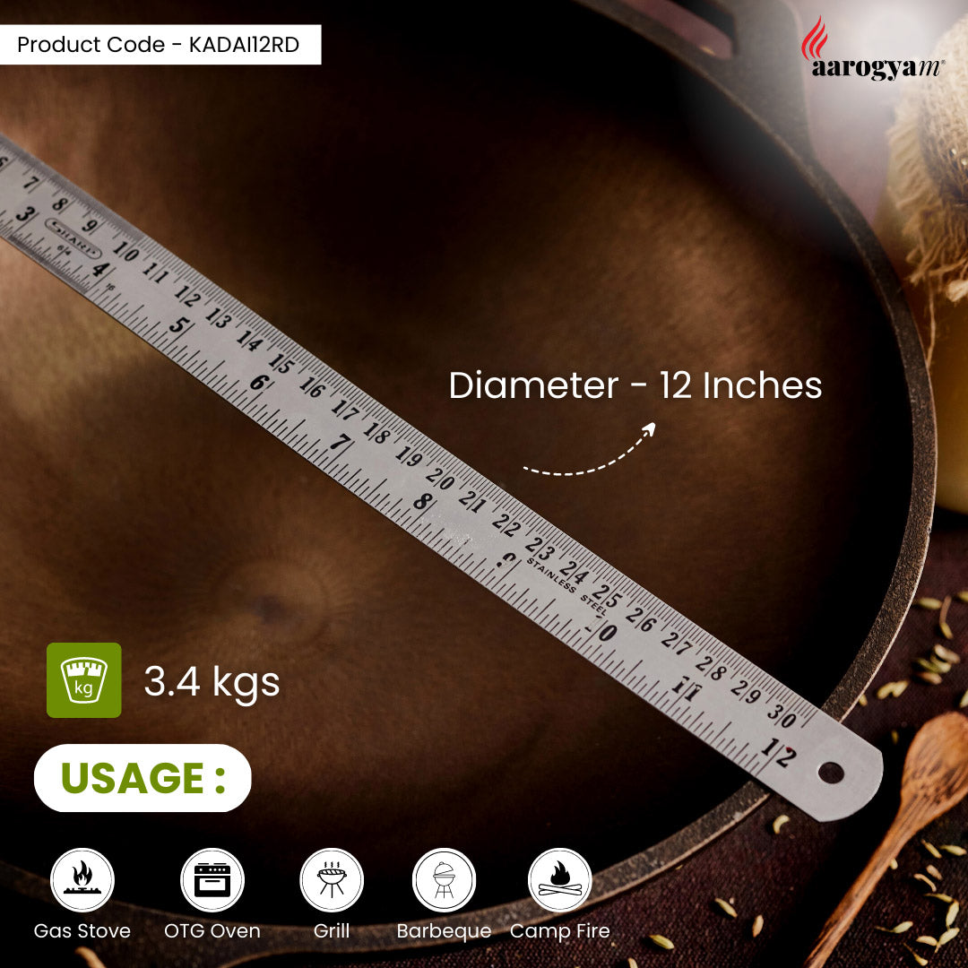 Frying pan with a ruler showing its diameter, brand 'aarogyan' visible