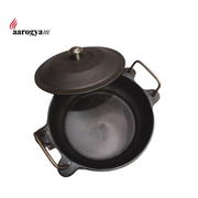 Black cast iron pot with lid on a white background, featuring the Aarogya brand.