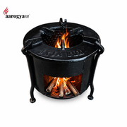 Black cast iron fire pit with flames on a white background, featuring the 'aarogyam' brand.