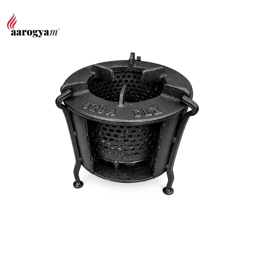 Black metal stove with 'aarogyam' branding on a white background