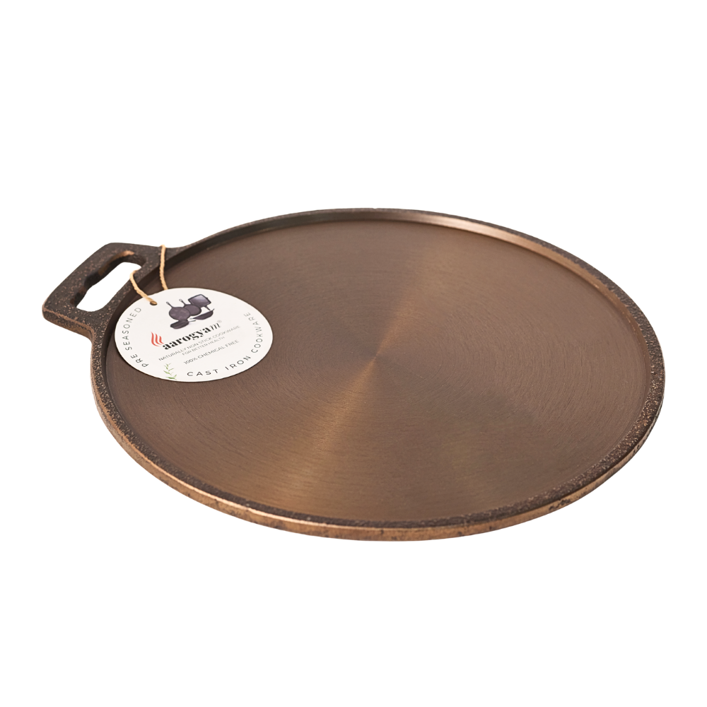 Bronze pizza stone with a handle on a white background