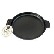Black cast iron skillet with a brand tag on a white background