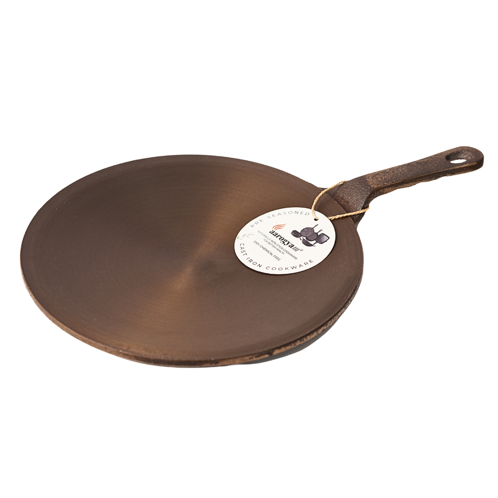 Brown cast iron pizza peel with a brand tag on a white background