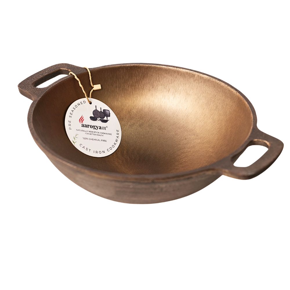 Bronze-colored cast iron cookware with a tag on a white background