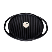 Black cast iron grill pan with a brand label on a white background
