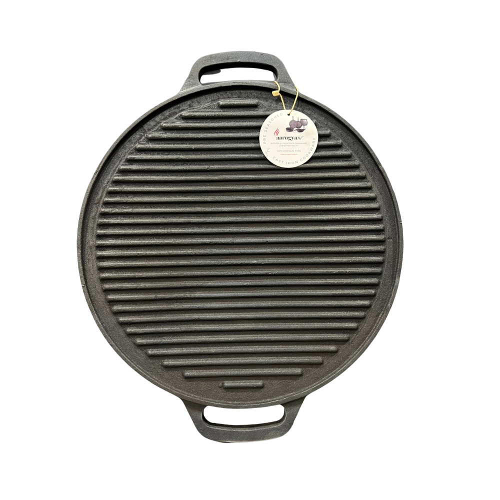 Cast iron grill pan with handles on a white background