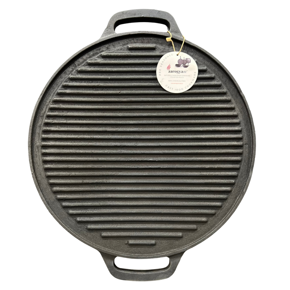 Cast iron grill pan with a handle on a white background