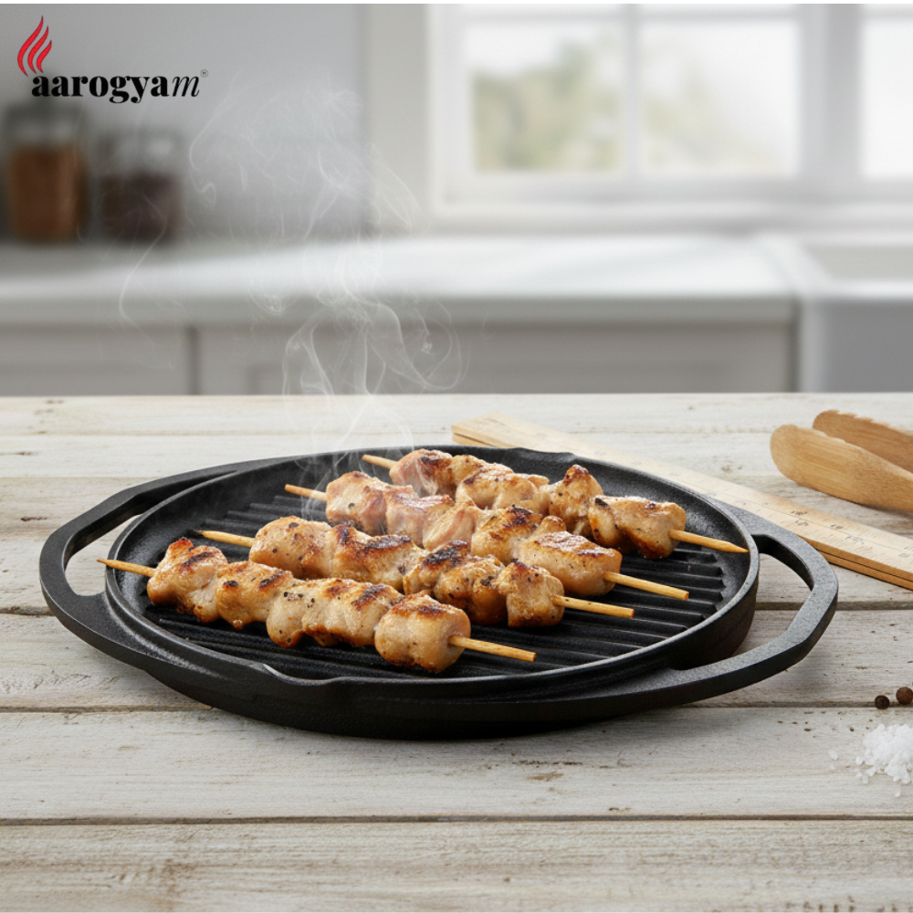 Skewered chicken on a grill pan with 'aarogya' branding in the corner.