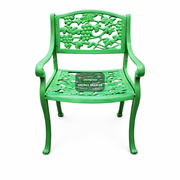 Green decorative chair with a product inside on a white background