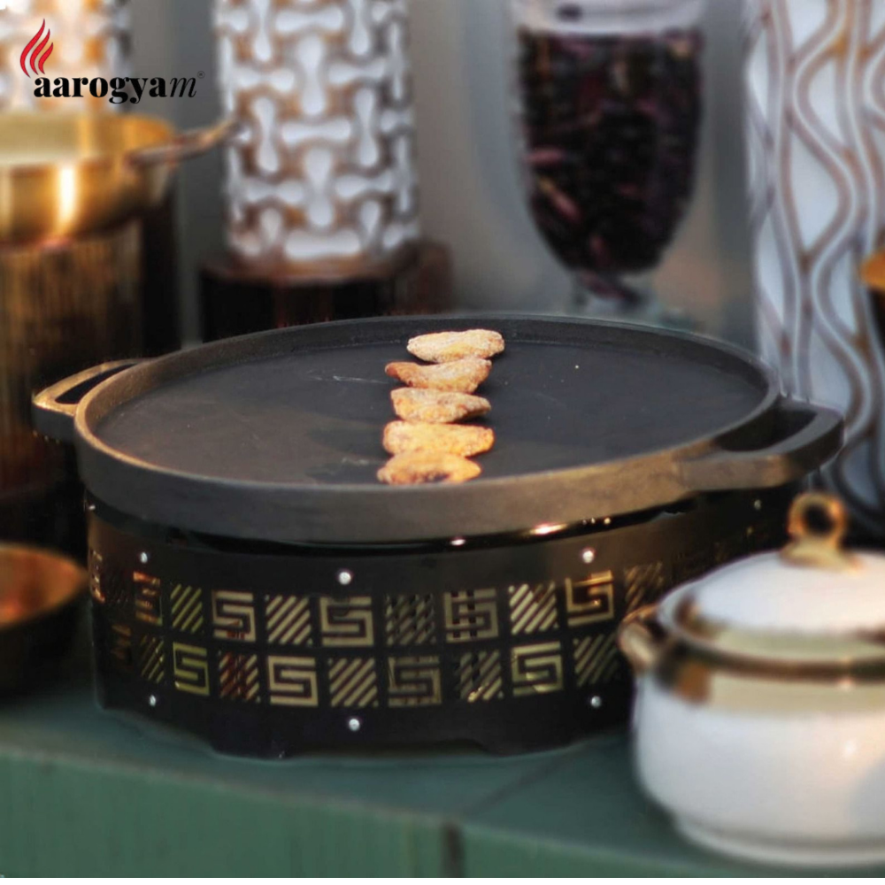 Black frying pan with food on a decorative table