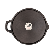 Black cast iron skillet with a brand label on a white background