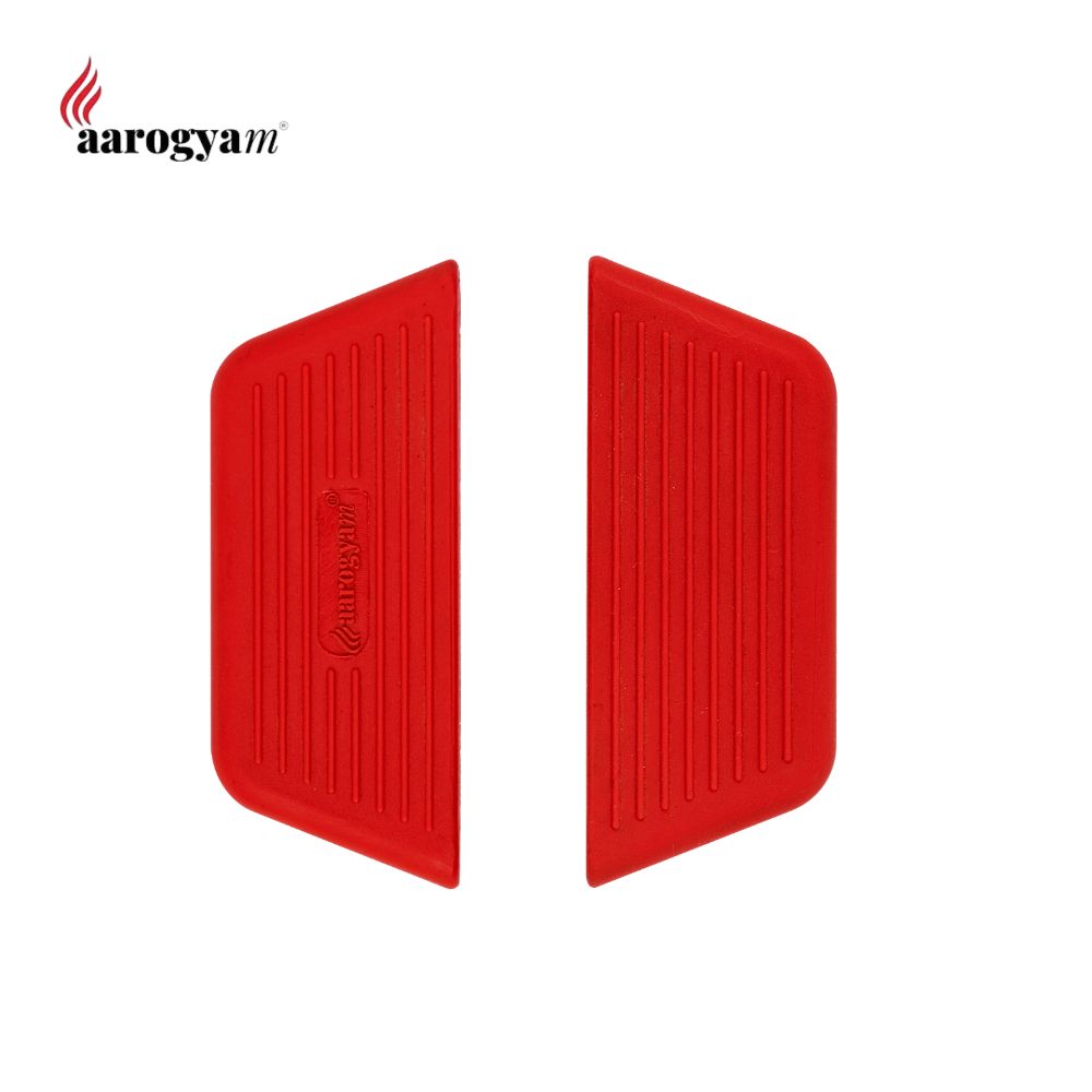Two red rubber mats with 'aarogyam' branding on a white background