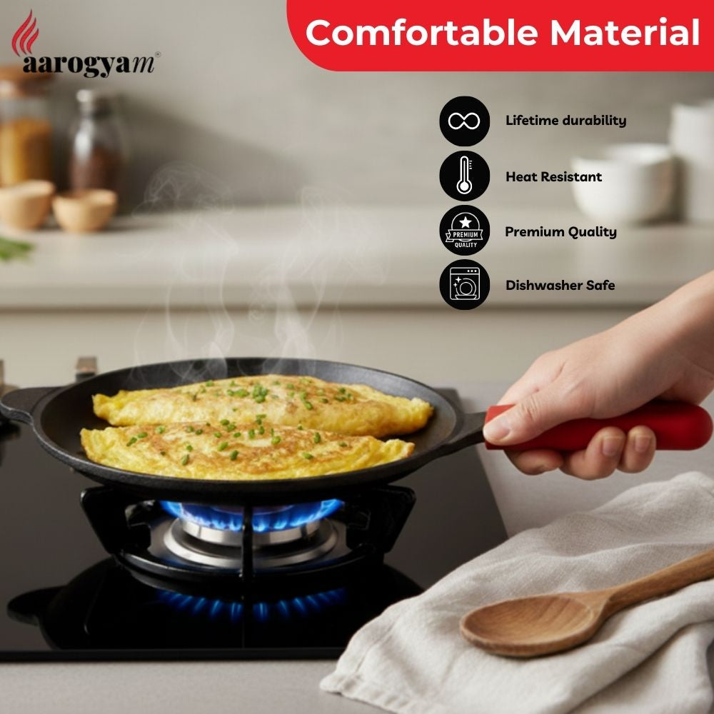 Person holding a frying pan with an omelette on a stove, featuring the Aarogya brand.