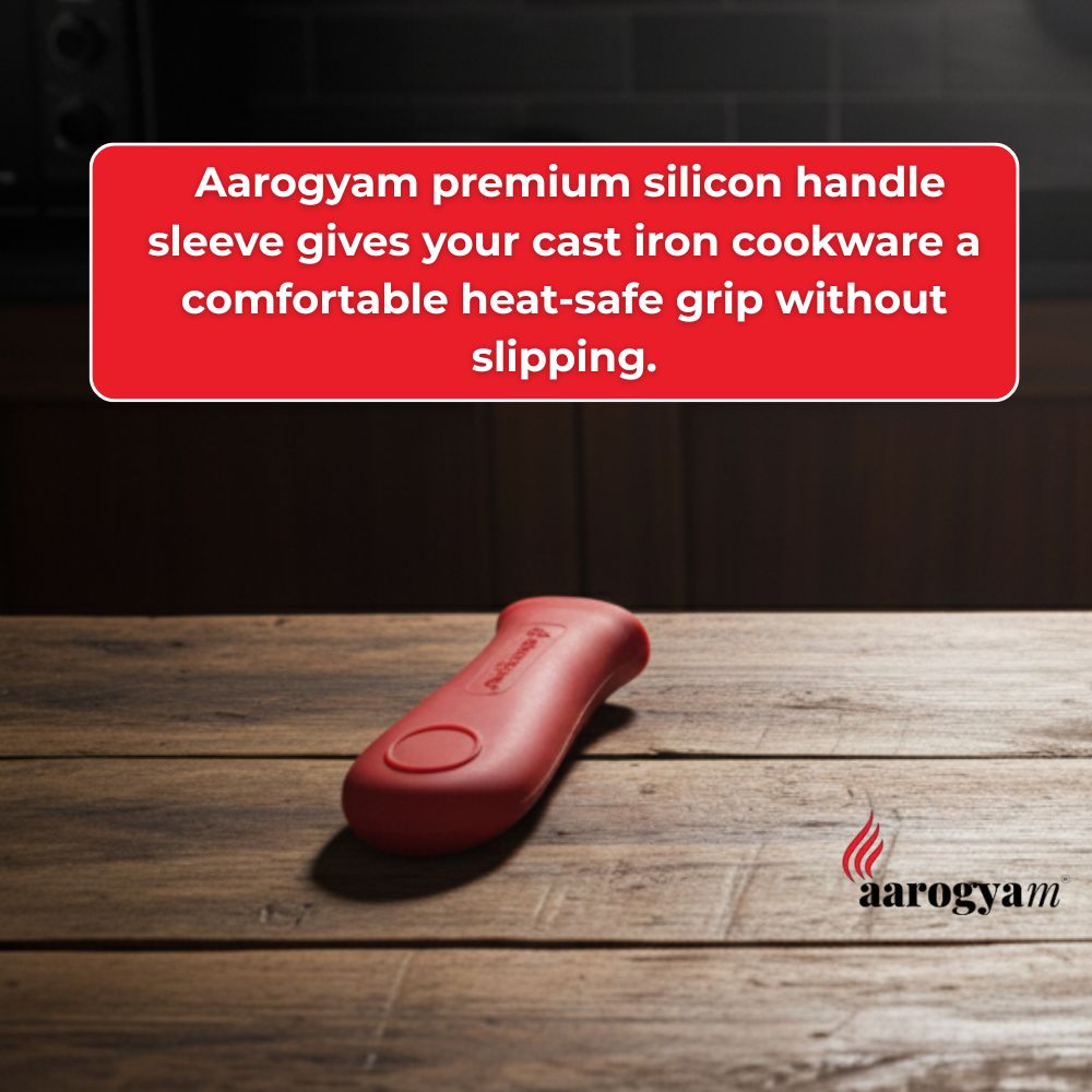 Red Aarogyam silicon handle sleeve on a wooden surface with promotional text.
