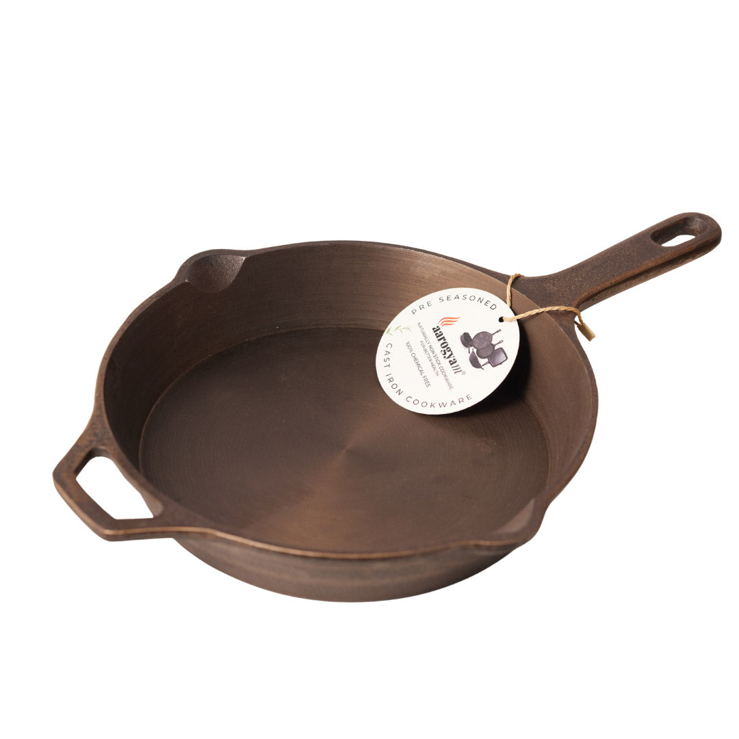 Cast iron skillet with a seasoning label on a white background