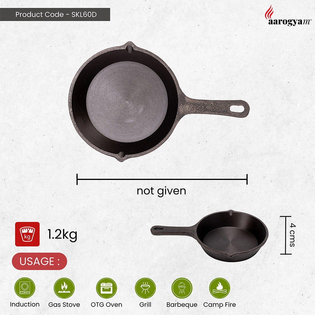 Black cast iron skillet with measurements and usage details on a white background