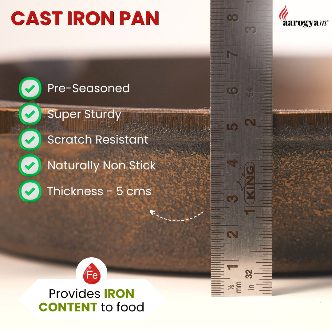 Cast iron pan with measurement details and Aarogyam brand logo.