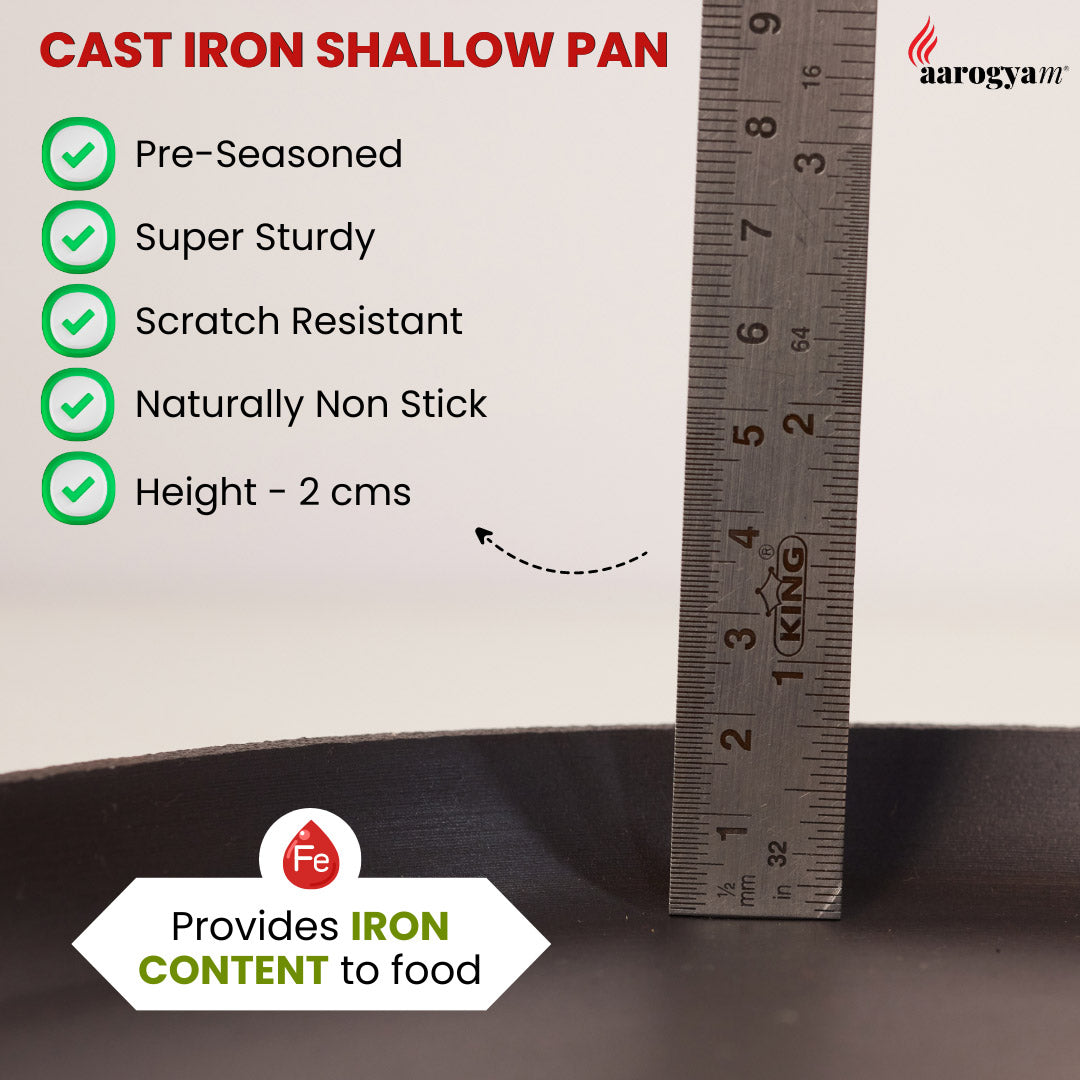 Cast iron shallow pan with measurement details and brand logo on a white background