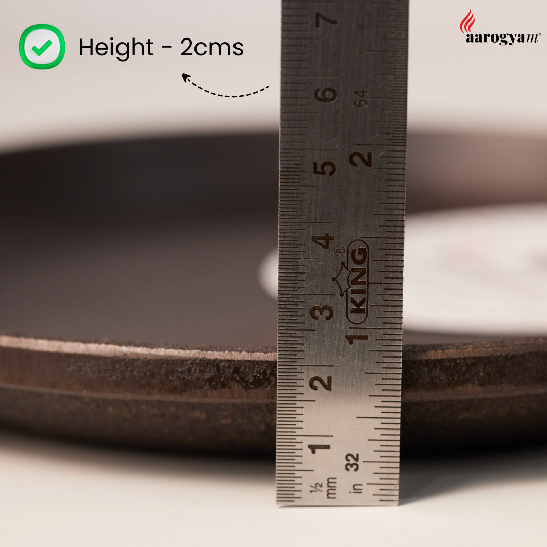 Measurement of a ceramic plate's height using a ruler, with 'aarogya' branding visible.