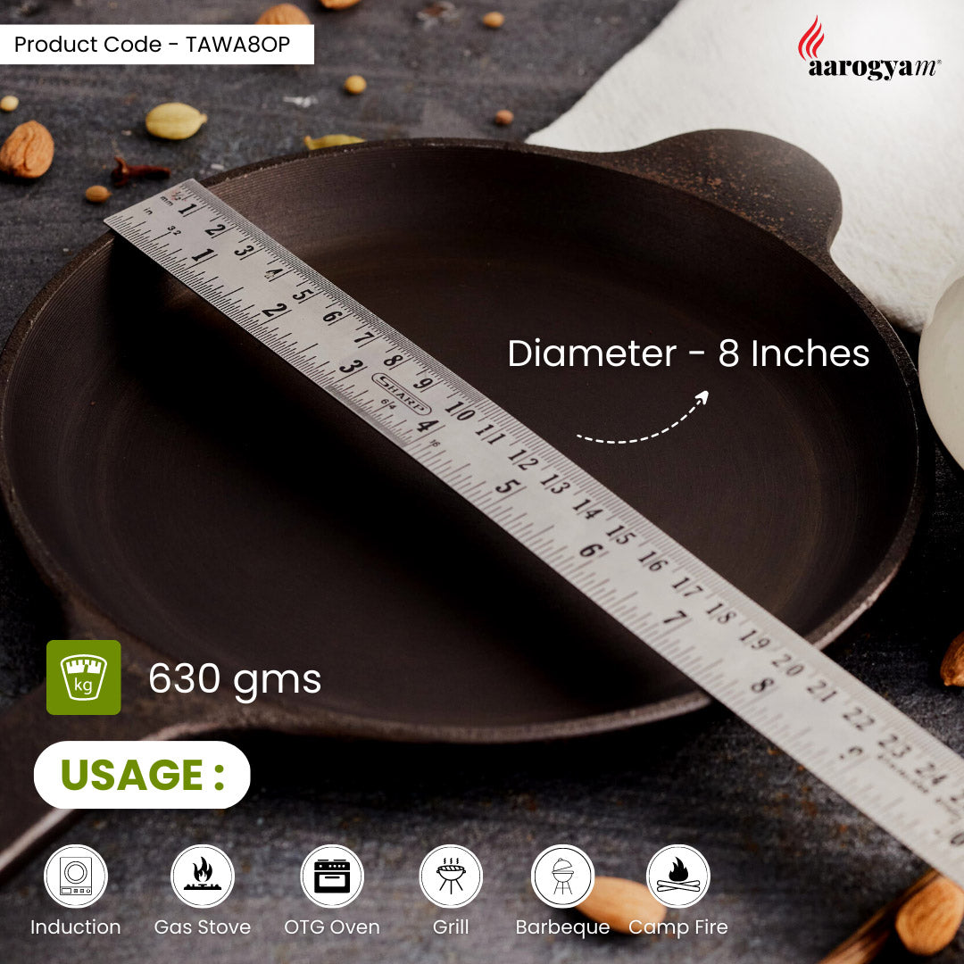 Iron tawa with measurement scale and product details on a dark surface
